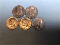 Five 1972 Kennedy half dollars