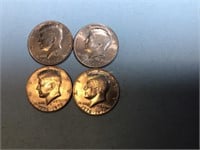 Four 1976 Kennedy half dollars