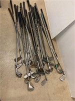 26 golf clubs. Assorted brands