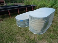 2 galvanized water tanks