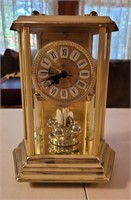 Elgin battery powered 400 day clock. 9" tall.