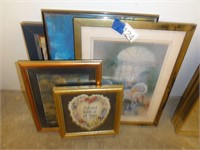 assorted framed pictures and quotes