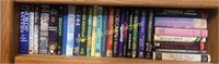 Shelf of science-fiction/fantasy hard cover books