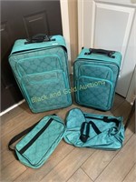 Rolling turquoise suitcase 4 piece set