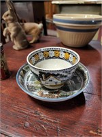 ANTIQUE SAUCER AND CUP