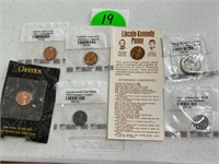 Assorted Pennies and Susan B. Anthony Dollar
