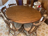 Wooden pedestal dining table and six chairs