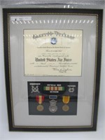 AIR FORCE HONORABLE DISCHARGE FRAMED W/ MEDALS