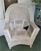 Wicker chair. 41" back, 30" wide. 14" seat