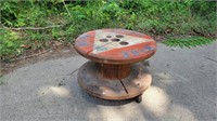 Rolling stool made from spool