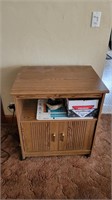 Small cabinet on casters and contents