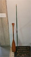 Canoe paddle and long bow