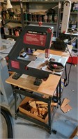 Black and Decker band saw on stand