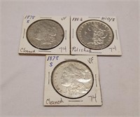 1882-O/S Dollar AU; (2) 1878-S Silver Dollars
