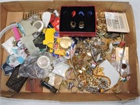 Box of key chains, jewelry, and more