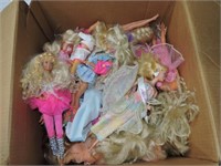 Large box of Barbie dolls