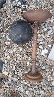 Cast iron Bird bath with painted bowling ball.