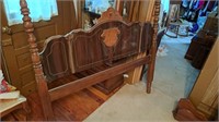 Full? size bed with headboard and footboard.