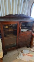 Antique cabinet with key. Approximately 48 tall,