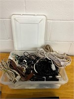 Lot of cords in plastic tote