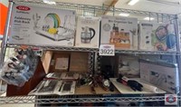 mix items. Lot of flatware, cutting boards,