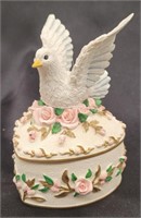 Holsted House molded resin musical bird box.  5"