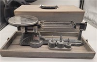 Ohaus triple beam balance scale with weights in
