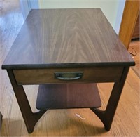 Mid-century end table. Wood with drawer and