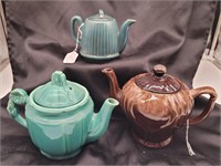 Vintage ceramic teapots. Chip under one lid. 6½",