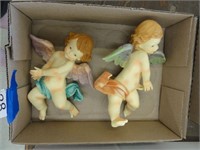 2 cherub wall hangings