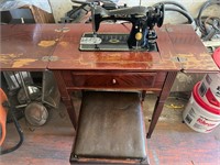 1953 singer sewing machine in cabinet with stool