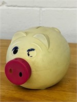 Plastic pig bank WITH PENNIES