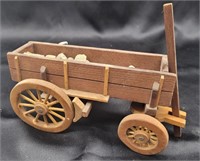 Wood Model of an 1800's wagon. 8"×4"×4".