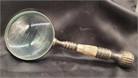 Magnifying glass with silver plated handle and