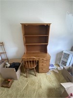 Desk with Bookshelf and chair and small dresser.
