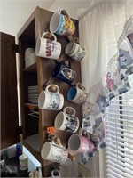 Lot of 9 mugs on hanging rack