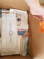Box of Linens, Table Runners, and Dollies.