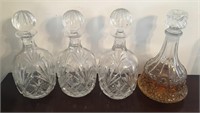 Lot of Four Ornate Glass Decanters
