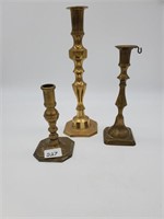 Three Tall Brass Candlesticks