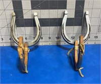 Horse shoe gun rack