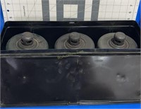 3 smudge  pots in a metal case