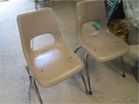 two plastic chairs