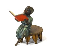 Vienna Bronze of A Boy Sitting on Table