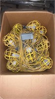 Lot of 2 box’s with yellow cage lights with cord