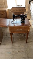 Antique Bel Air sewing machine with cabinet