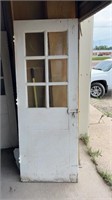 Large white door with 6 glass pains