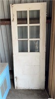 Large white door with 6 glass pains