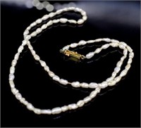 Rice pearl & 18ct Yellow gold clasp necklace