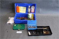Small plastic tool box with assorted content
