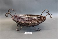 small woven basket with metal handles